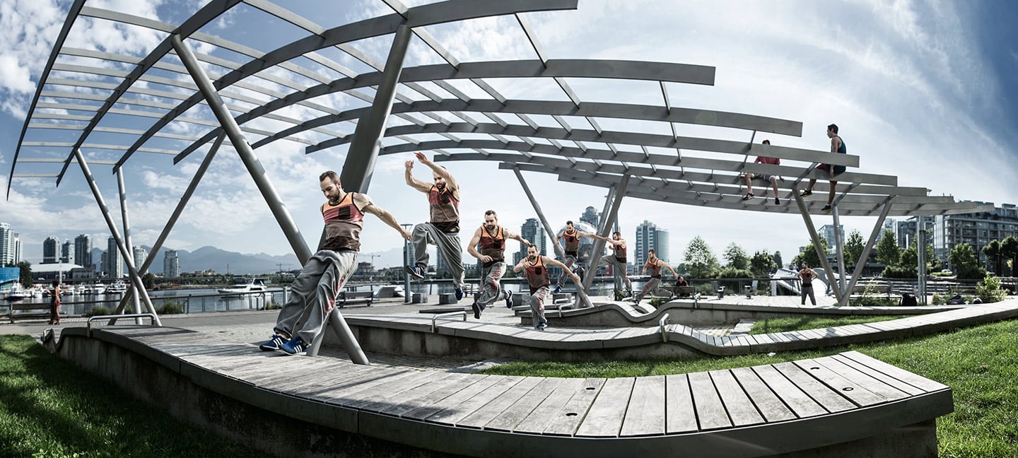 Parkour Athletes Image Running Jumping Sequence Background Against Bright Skies