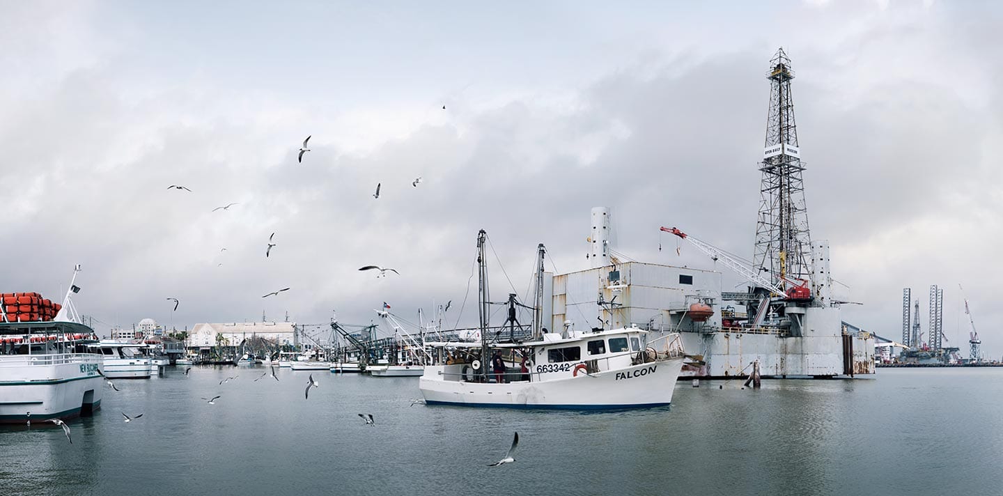 Shrimp Boats Docked on Water on Cloudy Day