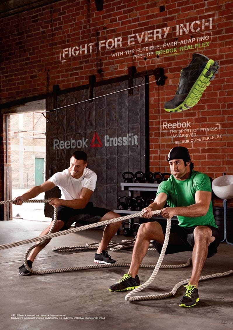 Two Men in Reebok Apparel Crossfit Workout Sled Pull Vertical