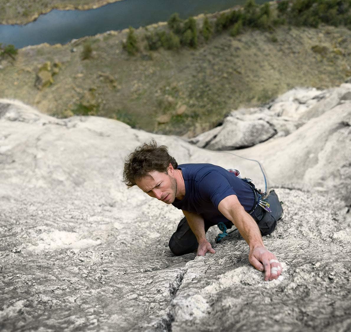 Rod Mclean - close up picture of man climbing