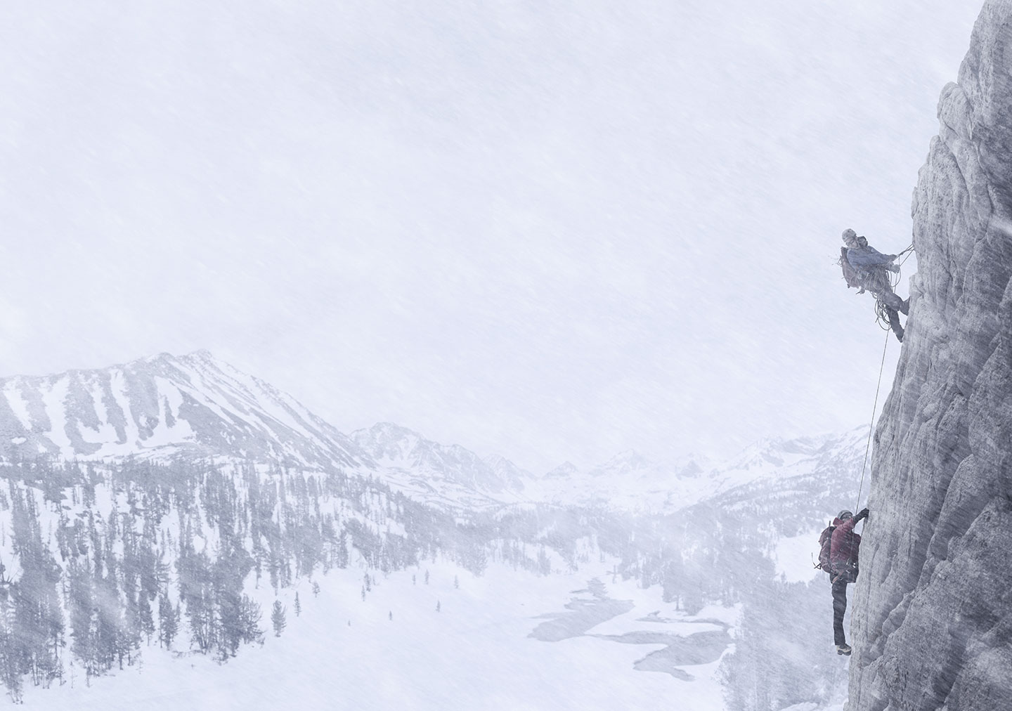 Rod Mclean PhotographyActive Lifestyle men rock climbing in the snow