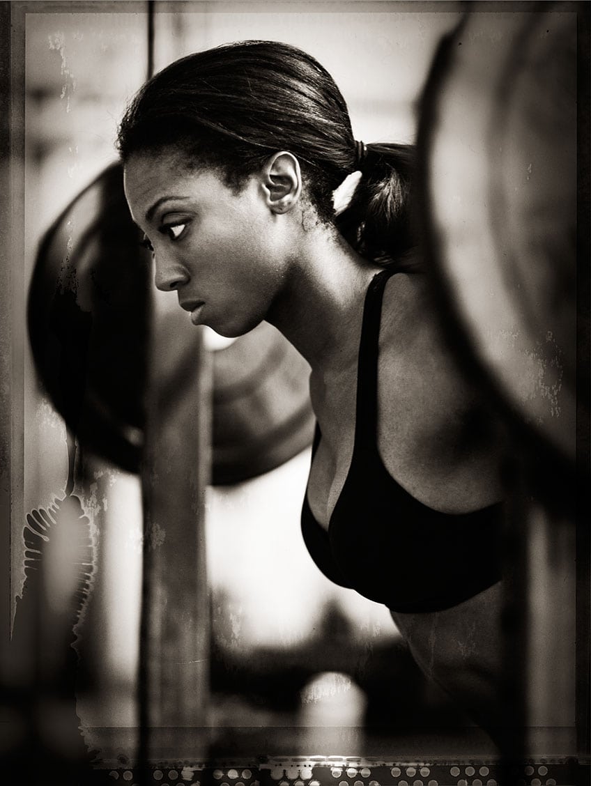 Black and White Sepia Profile Athlete Nicole Harris Weight Lifting Squat Two Piece Workout Apparel Chanel